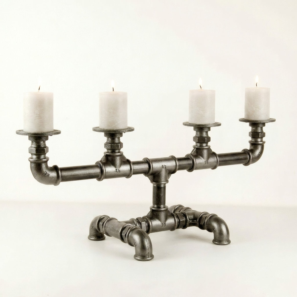 Bougeoir 4 bougies en fonte - photo produit fond blanc 3