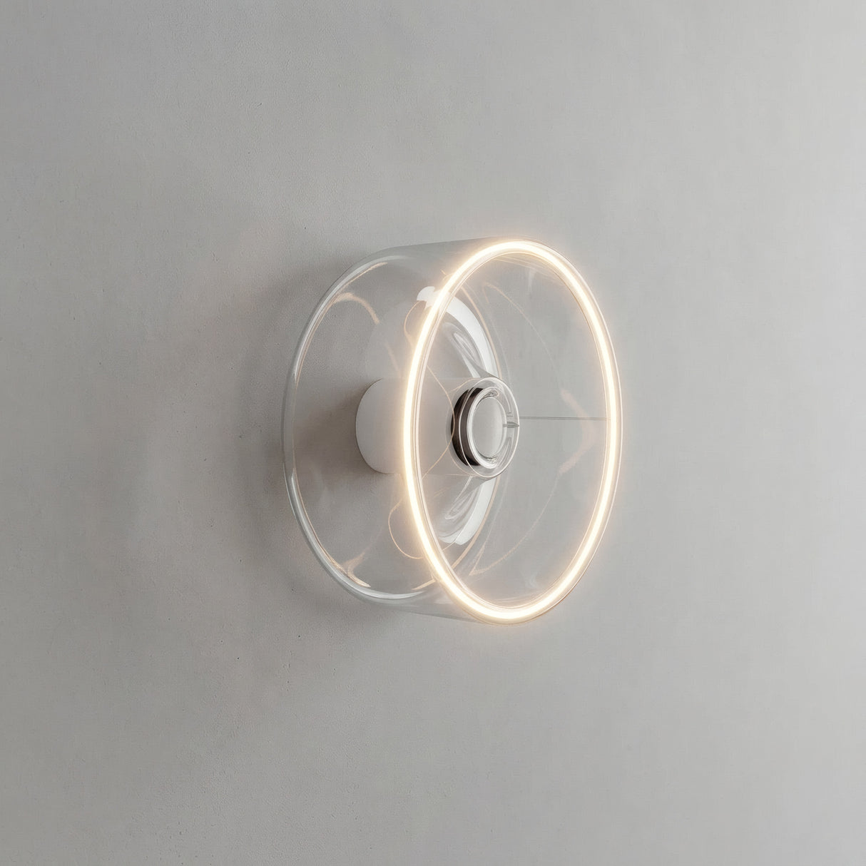 Żarówka LED donut E27 z przezroczystego szkła, Ø 195 mm, włączona jako kinkiet w oszczędnym wnętrzu
